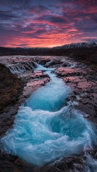 Sunset-at-the-waterfall-Brúarfoss-200x355